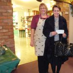 PRESENTATION TO NORFOLK HOSPICE TAPPING HOUSE. Sheila Wright of Elgood’s Visitor Centre & Rebekah Mills of Norfolk Hospice following the presentation of the cheque.